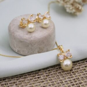 CONJUNTO BRINCO E COLAR LAÇO + PÉROLA BANHADO A OURO 18K